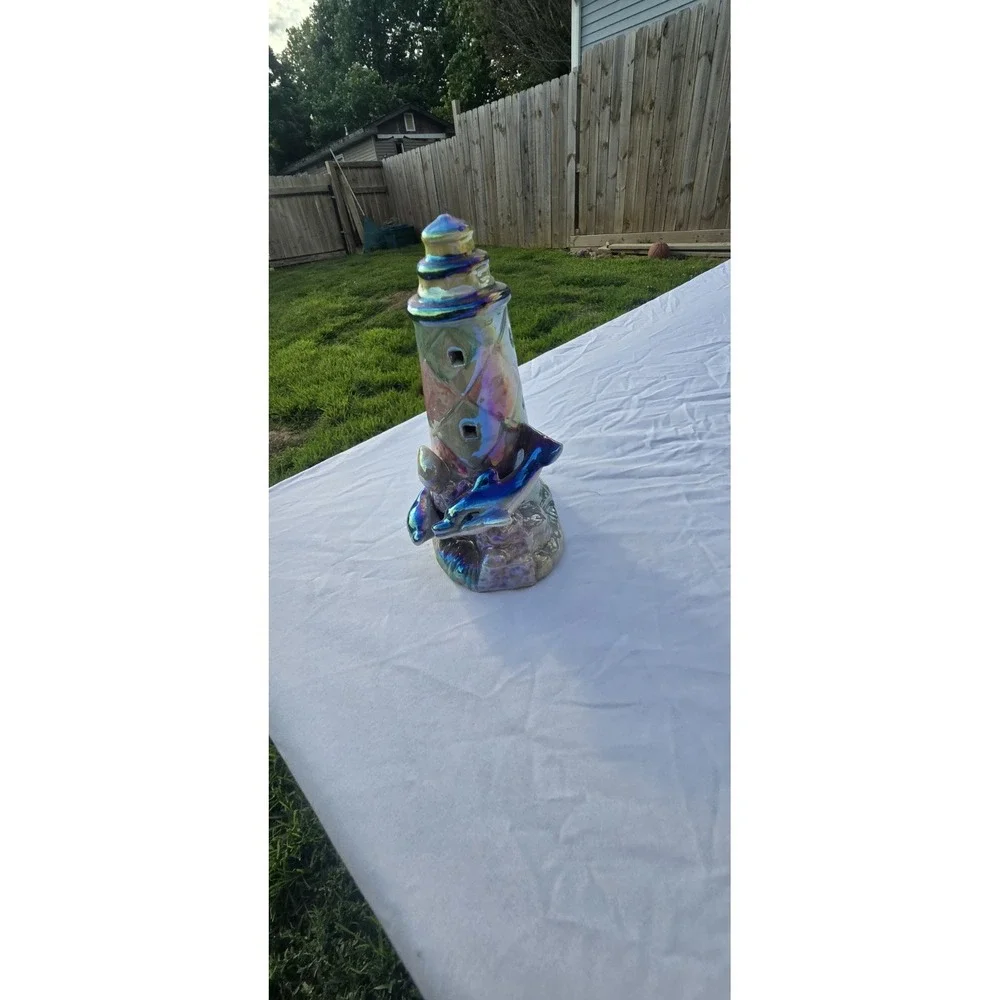 vintage iridescent ceramic dolphin lighthouse figurine